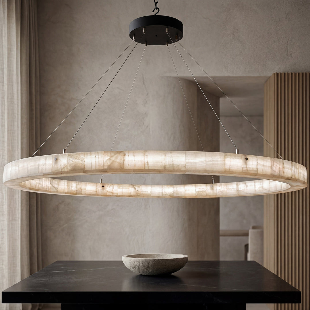 Handcrafted wrought iron alabaster chandelier featuring natural stone illumination and artisan craftsmanship