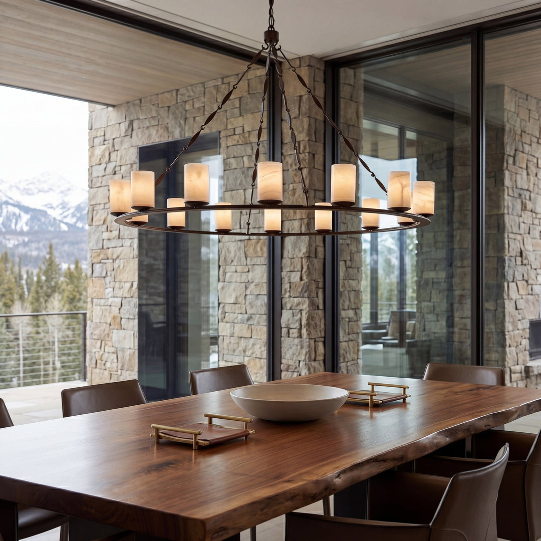 Handcrafted wrought iron designer lighting chandelier with artisan forged iron details in a luxury custom home interior
