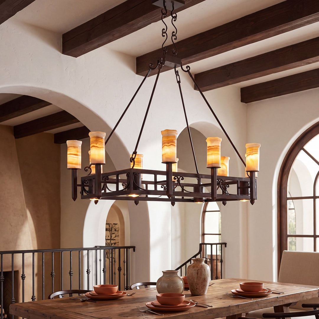 Mission Forge Spanish Colonial lighting collection with wrought iron chandeliers, architectural sconces, and natural alabaster vanity lights.