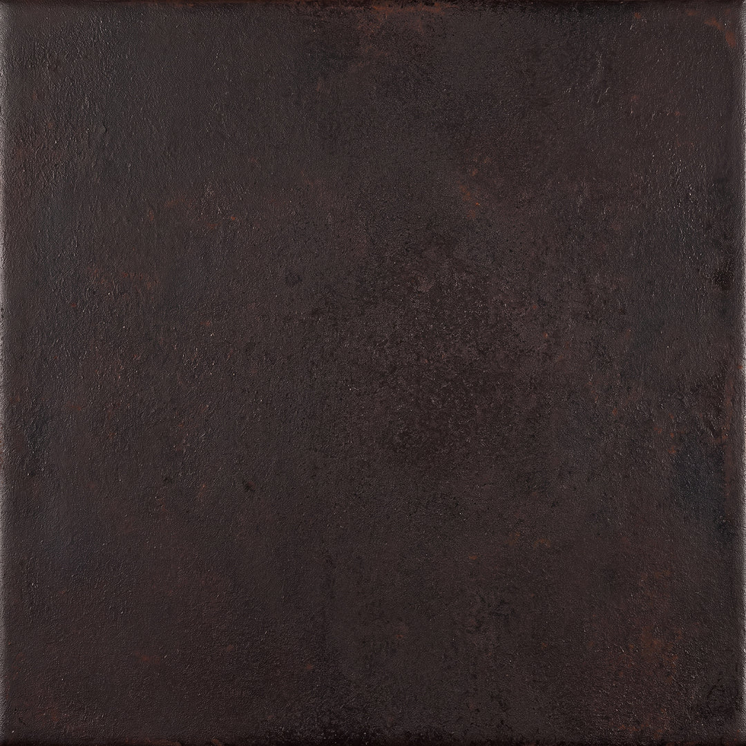 Aged Iron finish on wrought iron showing a dark architectural surface with restrained variation and natural material character.