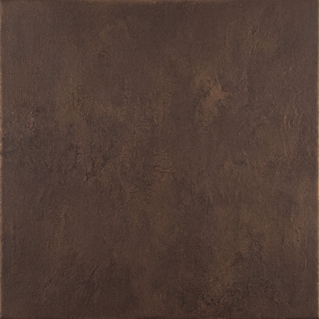 Antique Old World hand-applied wrought iron finish showing aged tones, dimensional texture, and highlighted surface detail.