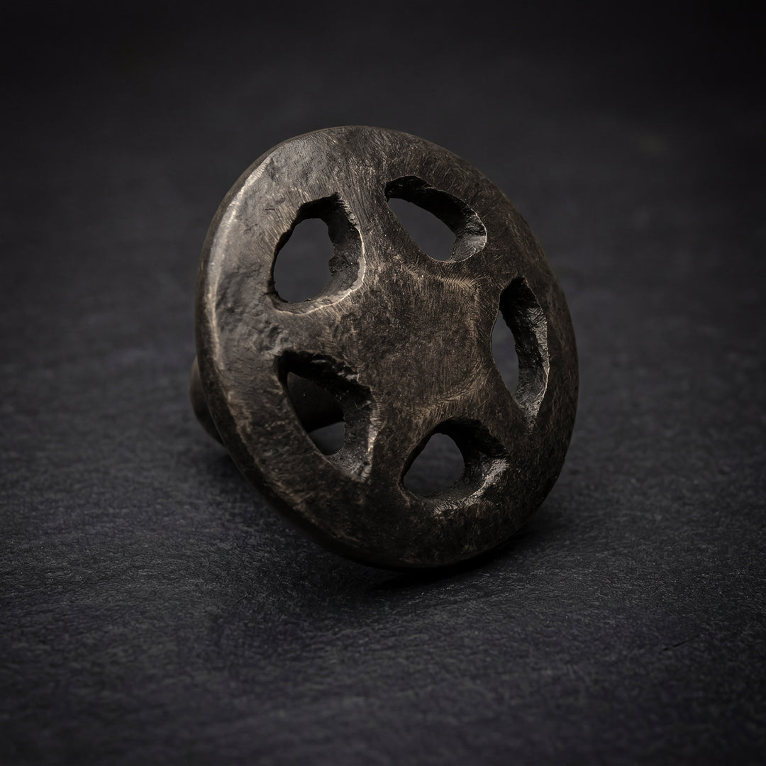Astra handcast bronze star cabinet knob in solid bronze hardware with cut-through star design and sculptural form