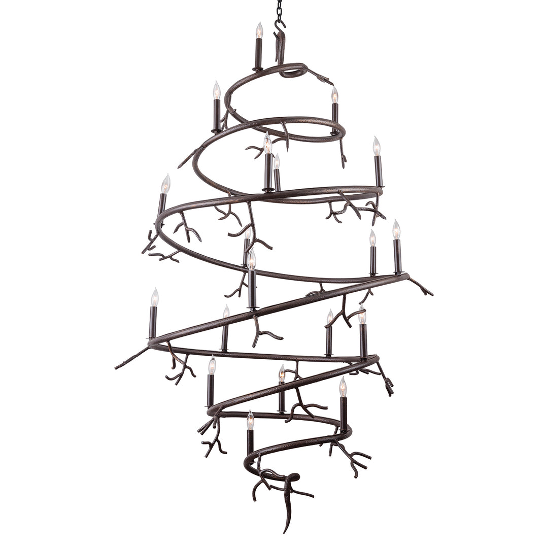 Autumn sculptural wrought iron branch chandelier with spiraling frame, candle lights, twig details, and a dark artisan finish.