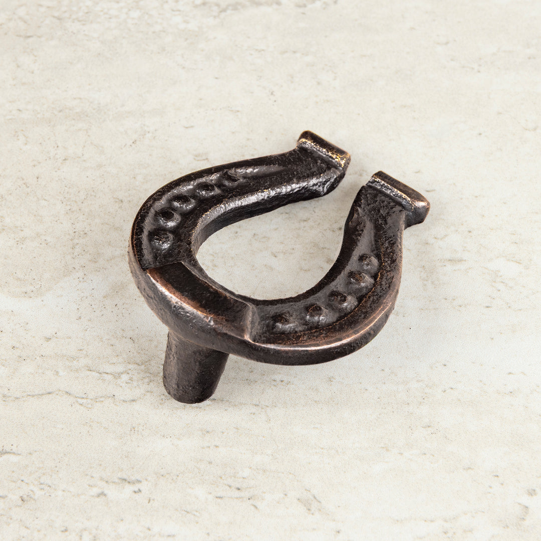 Bridle horseshoe bronze cabinet knob with handcast western inspired design and rustic luxury texture
