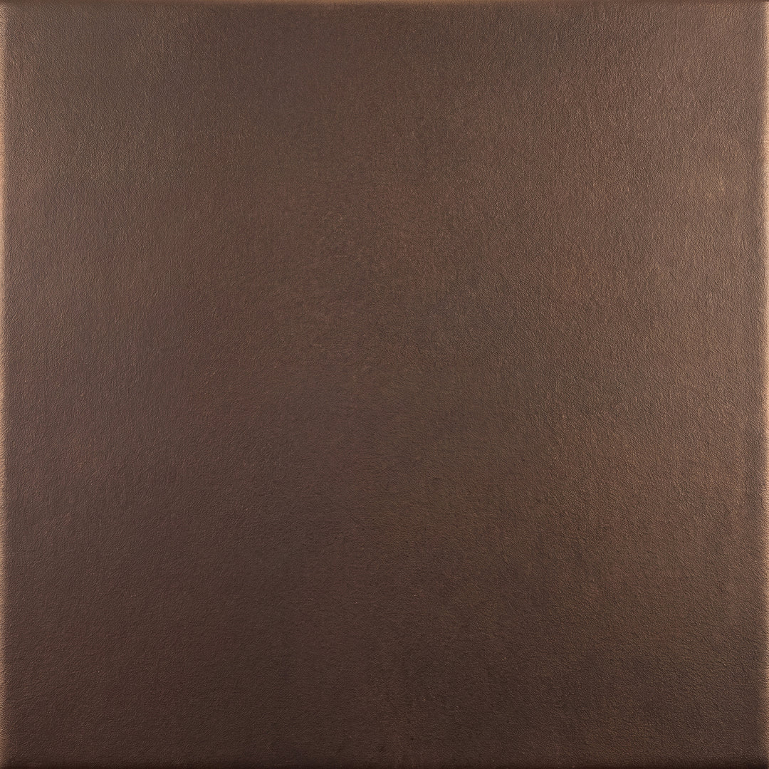 Bronze hand-applied wrought iron lighting finish with deep warm coloration and subtle tonal variation across the iron surface.