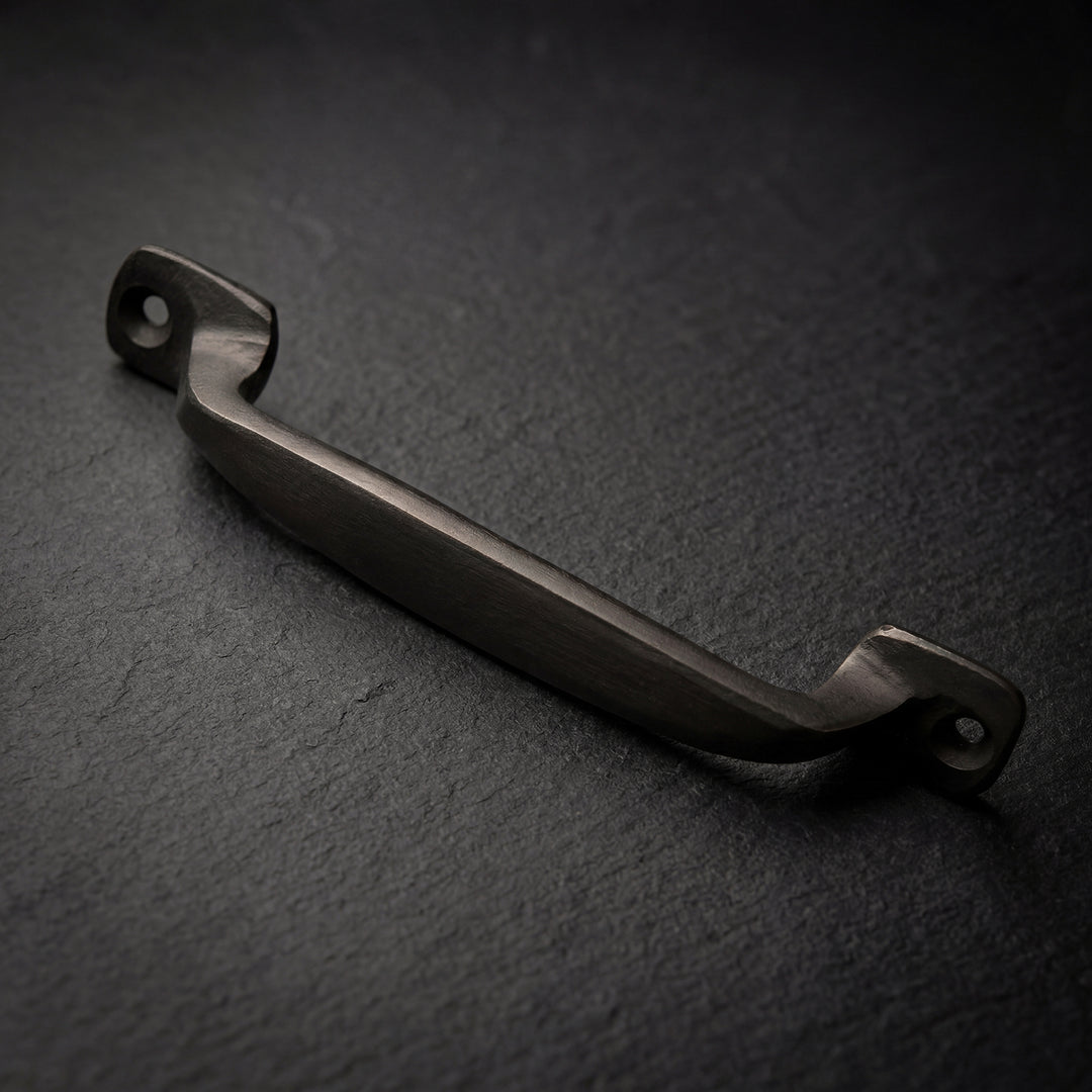 Camden handcast bronze hammered cabinet pull in solid bronze hardware, artisan made in Dallas with textured surface and natural patina