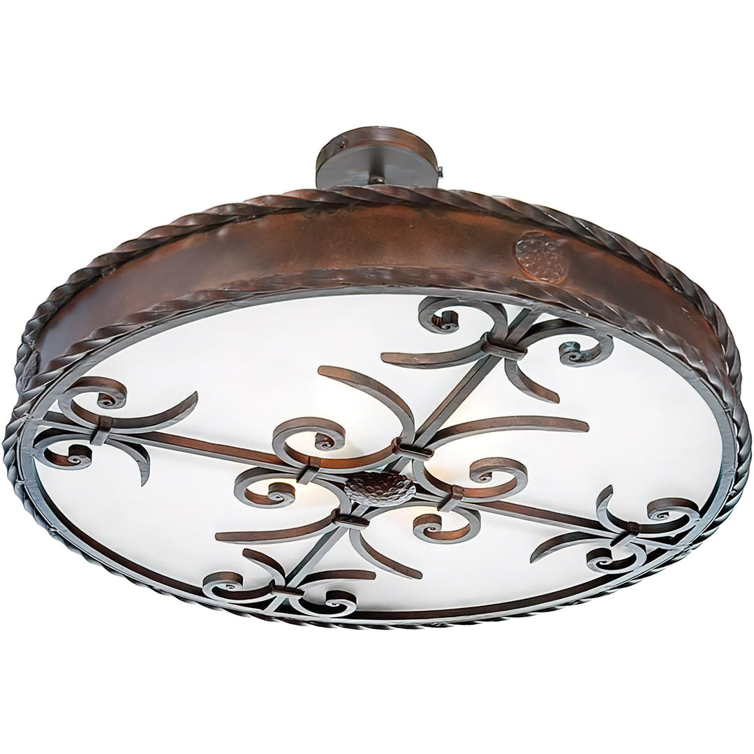 Caspian wrought iron flush mount ceiling light with round frame, decorative scrollwork, rope-edge detail, and artisan finish