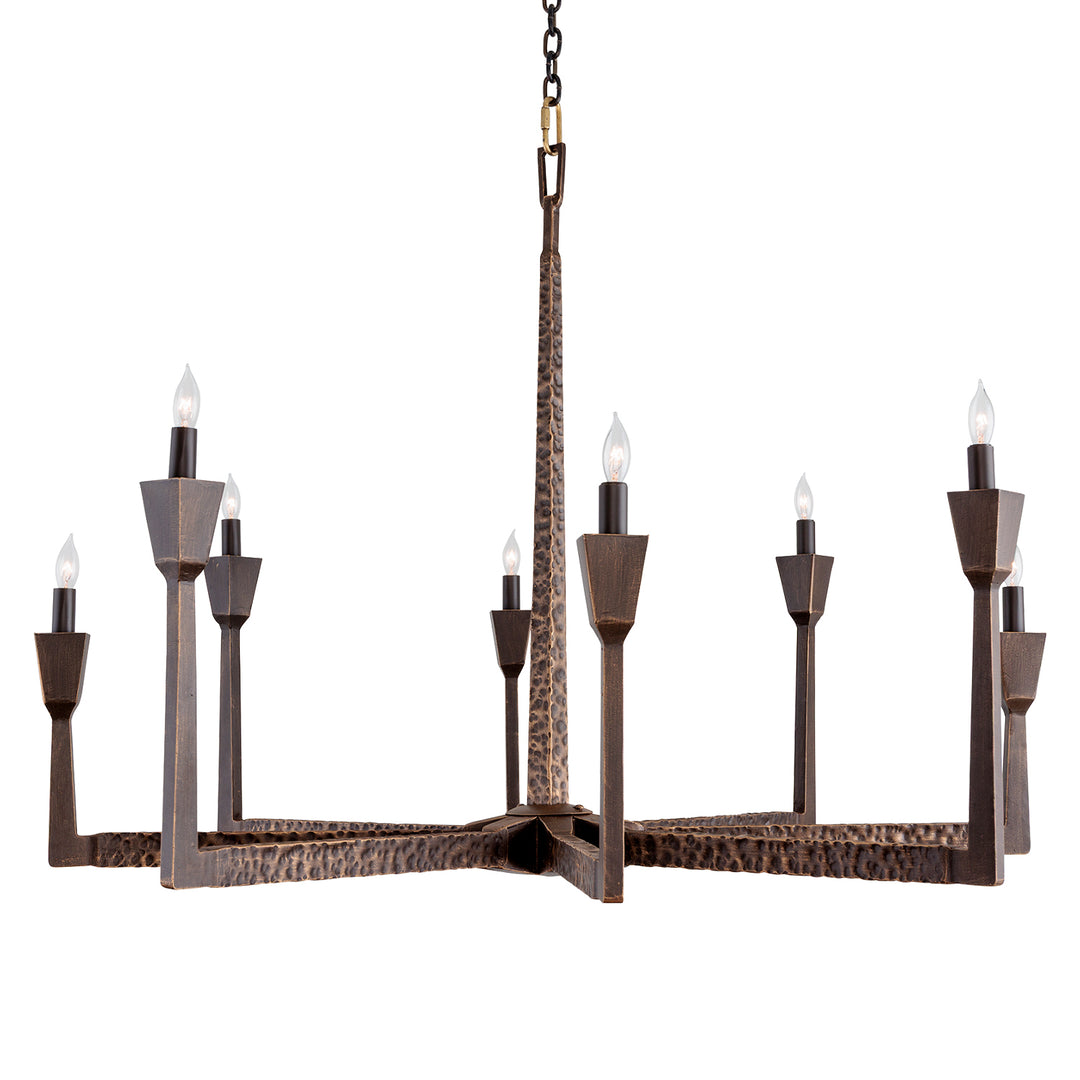Dalen wrought iron chandelier with radial iron arms, elevated candle-style lights, and a structured architectural silhouette.