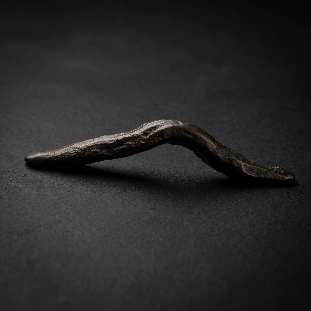 Drift handcast bronze organic cabinet pull in solid bronze hardware with sculptural branch-like form and natural patina