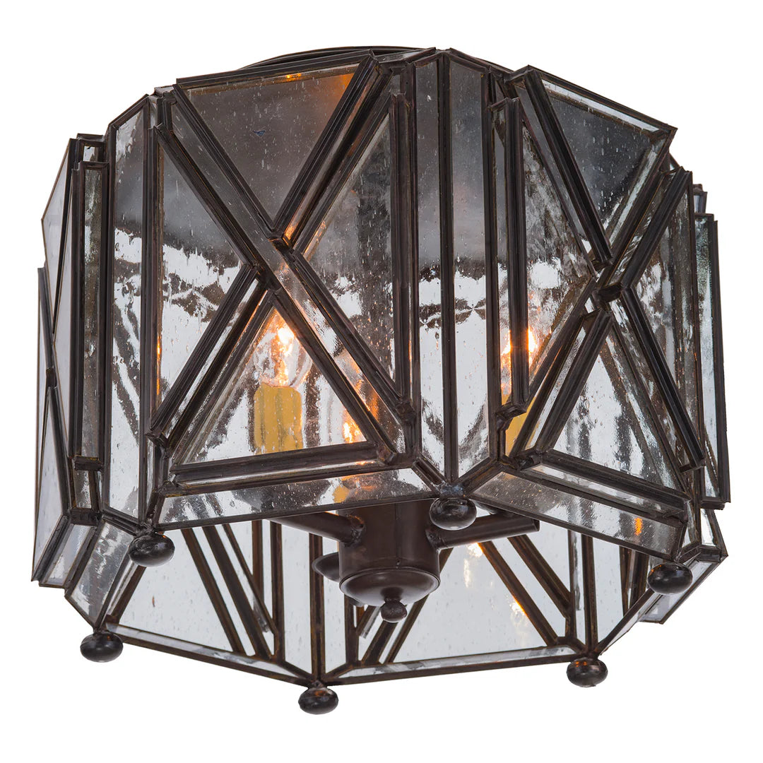 Equis designer flush mount light fixture with wrought iron geometric frame, seeded glass panels, and artisan finish