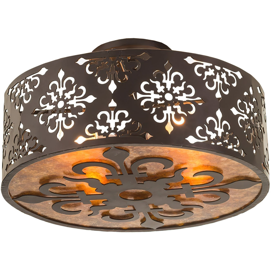 Fitzgerald designer alabaster flush mount lighting with ornate iron cutwork, warm stone diffuser, and artisan finish