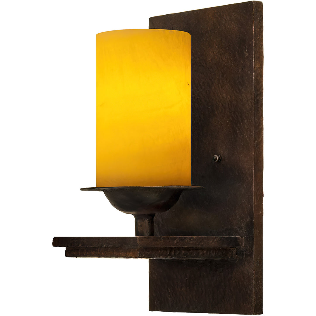 Gothica wrought iron alabaster wall sconce with rectangular artisan-finished iron backplate and softly illuminated natural stone shade.