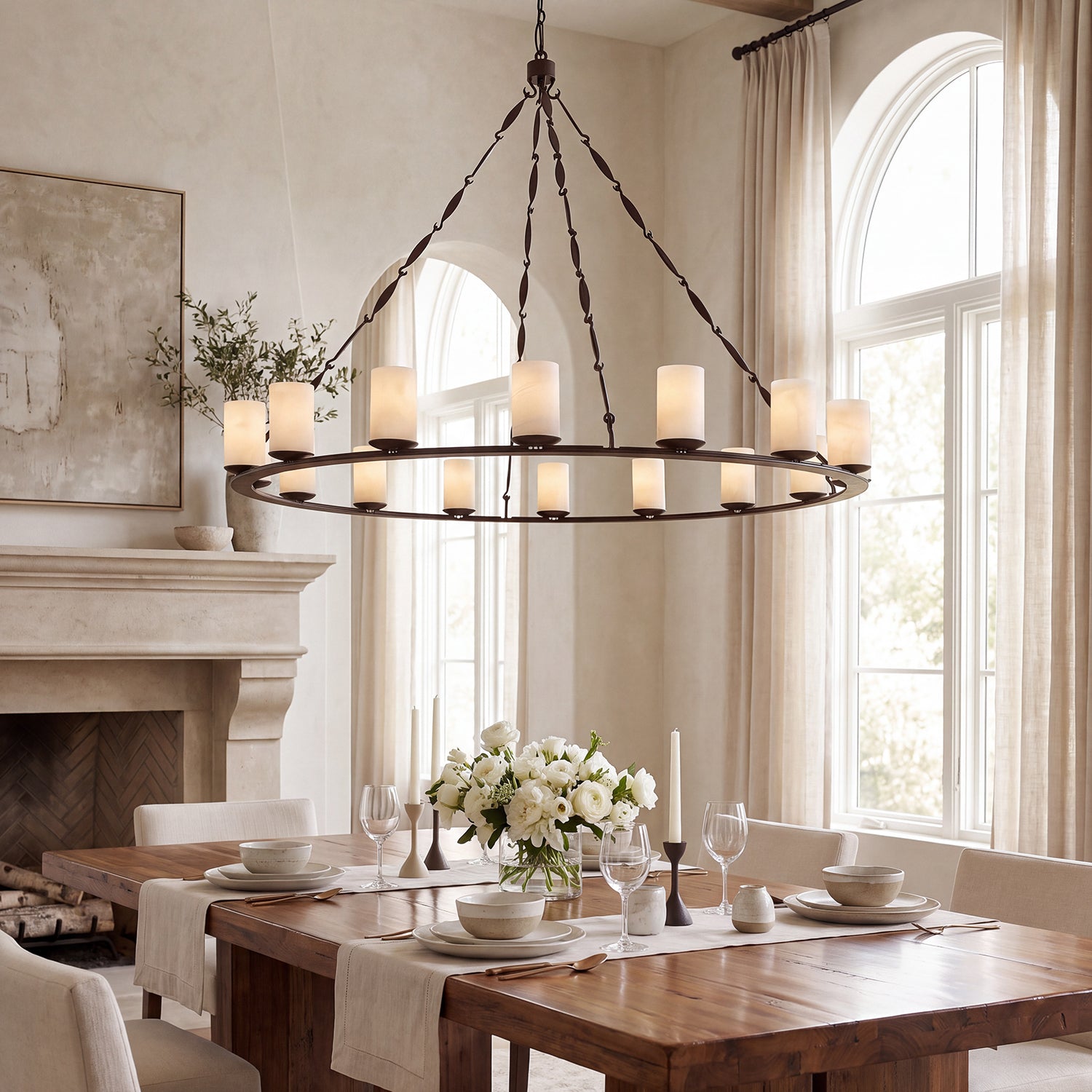Marcella architectural wrought iron ring chandelier with cylindrical natural alabaster shades around a handcrafted circular iron frame inside of a modern refined dining room.