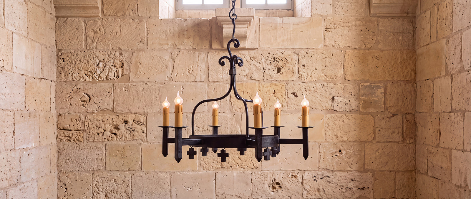 Mission architectural lighting collection featuring wrought iron sconces, natural alabaster vanity lights, and coordinating chandelier designs.