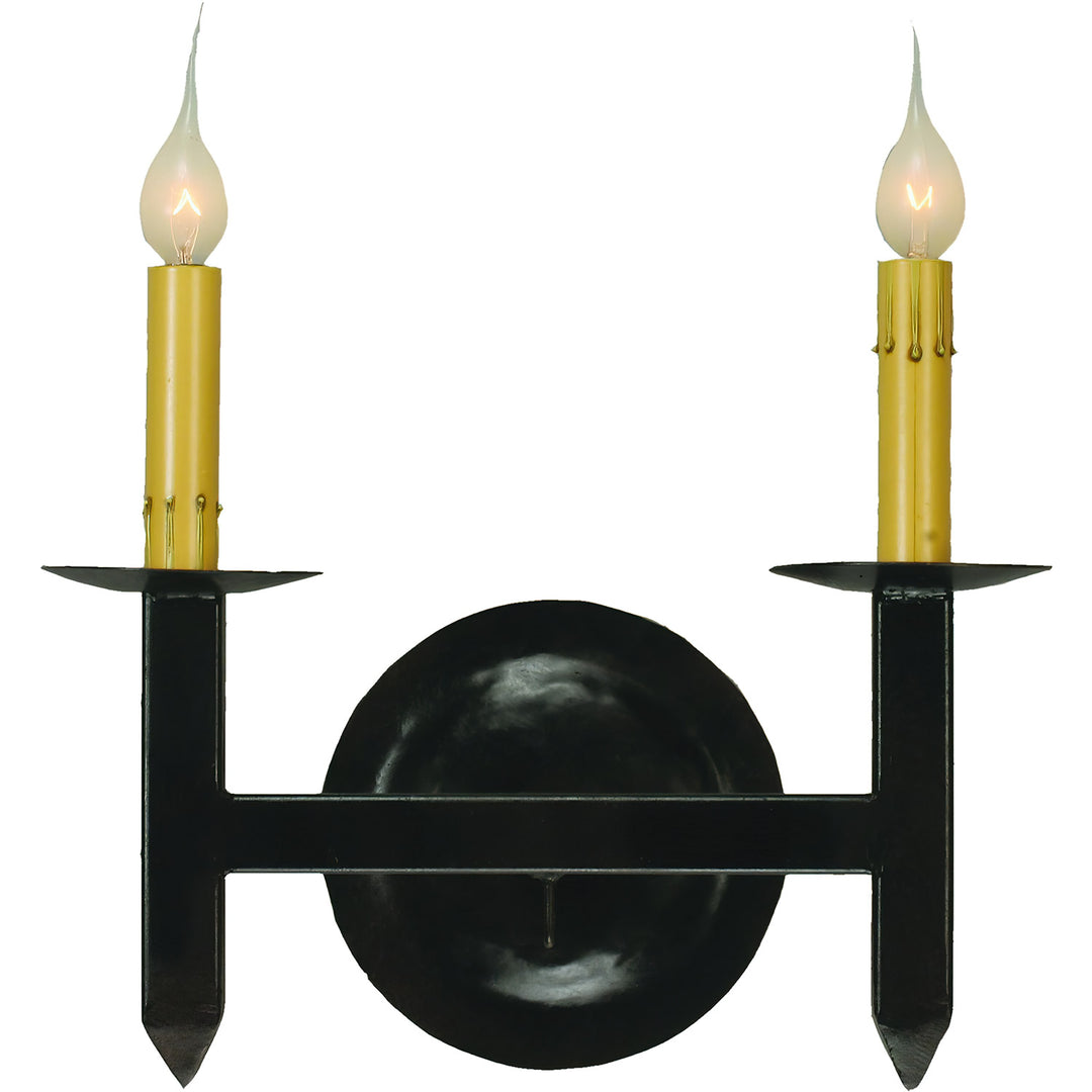 Mission two-light wrought iron wall sconce with geometric iron framework, circular backplate, pointed details, and candle-style lights.