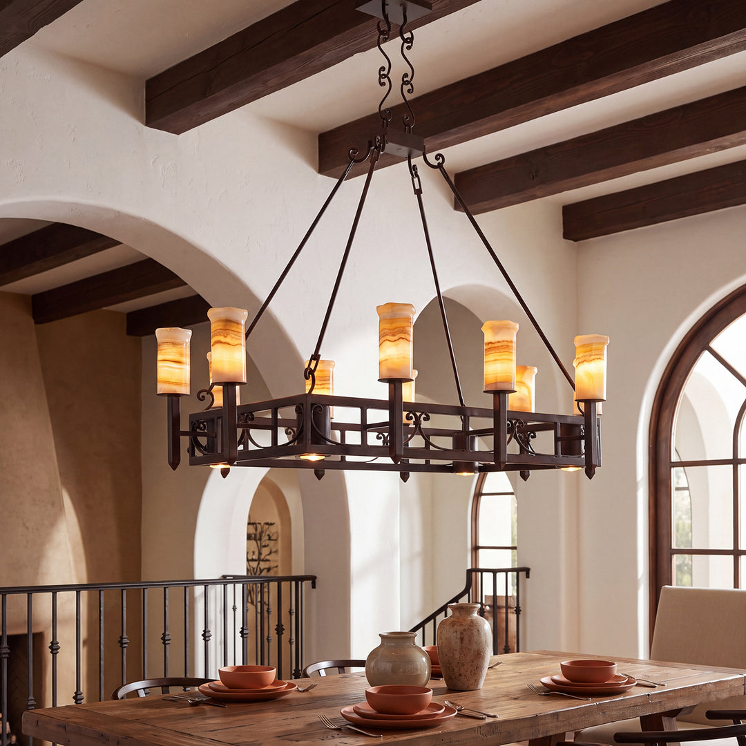 Mission Forge Spanish Colonial lighting collection with wrought iron chandeliers, architectural sconces, and natural alabaster vanity lights.