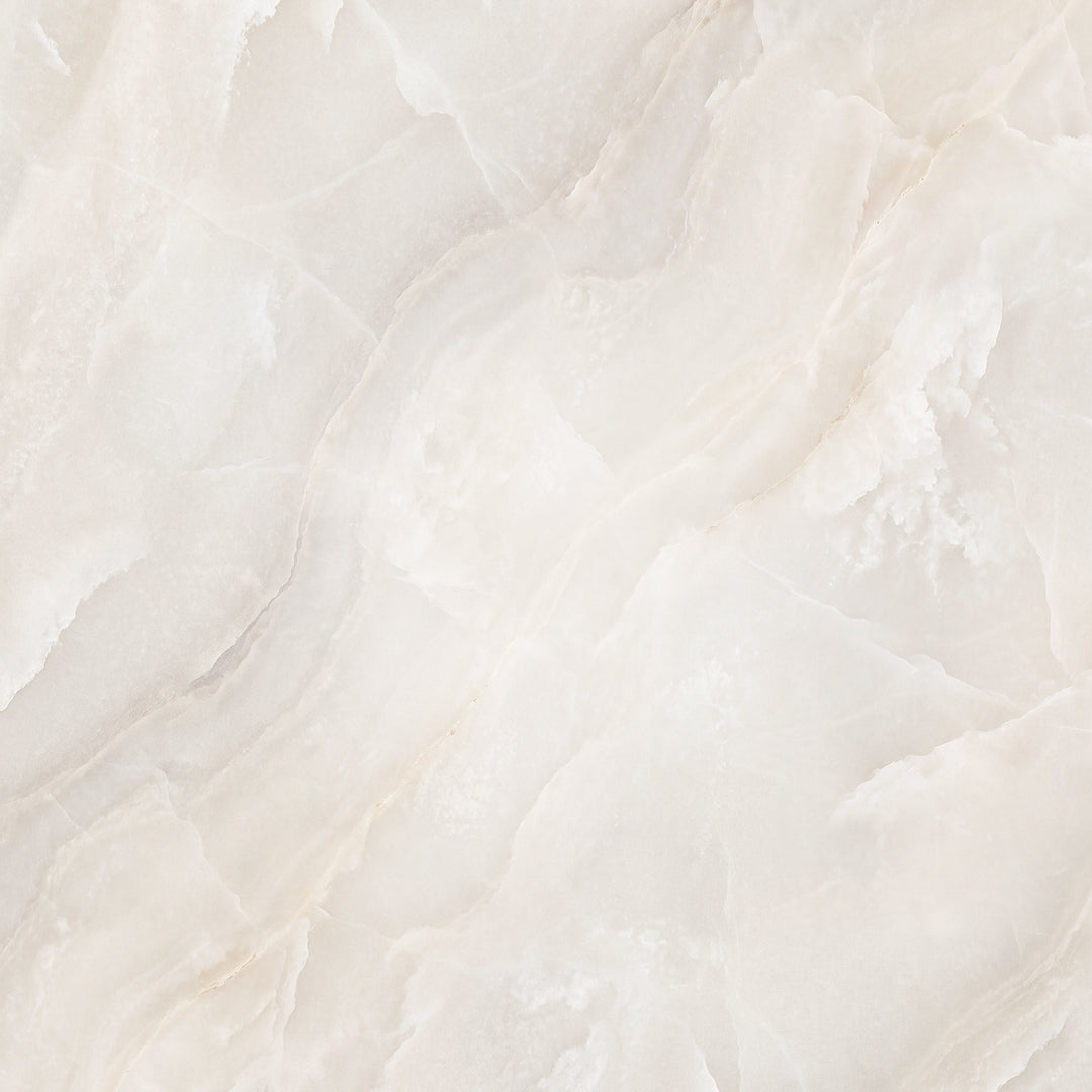 Natural White alabaster for designer lighting showing soft ivory translucency, subtle mineral veining, and naturally occurring stone variation.