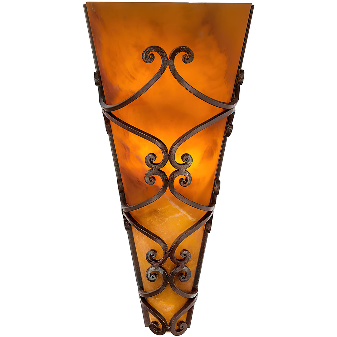 Paramount tapered wrought iron alabaster wall sconce with amber-toned stone, ornate scrollwork, and a dark hand-applied iron finish.
