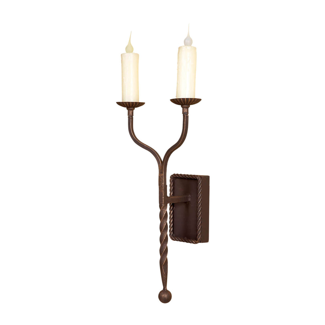 SC-855 two-light wrought iron wall sconce with twisted stem, curved candle arms, rope-edged backplate, and dark iron finish.