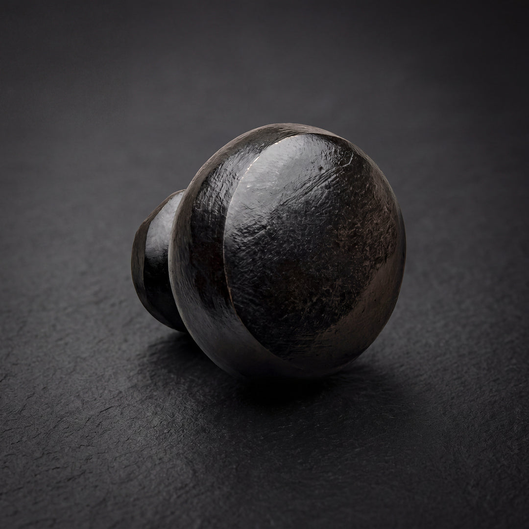 Strata handcast bronze banded cabinet knob in solid bronze hardware with rounded form and integrated horizontal detail