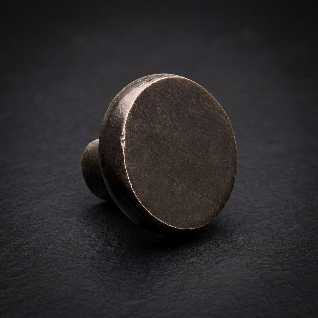 Talon handcast bronze disc cabinet knob in solid bronze hardware with flat face and minimal architectural design