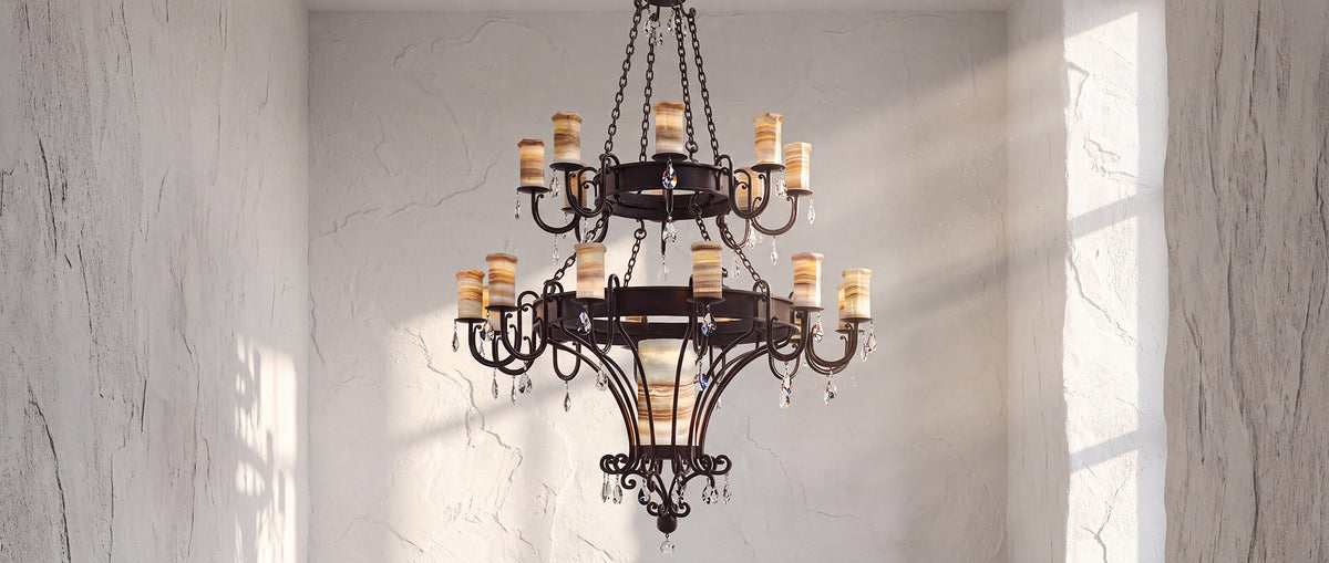 Trevi heirloom two-tier alabaster chandelier with sculptural ironwork, luminous natural stone shades, and suspended faceted crystal accents.